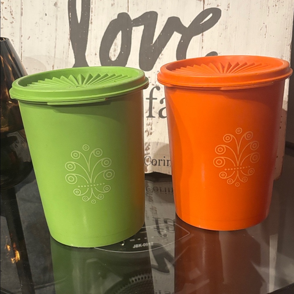 Two vintage Tupperware containers made in the USA.